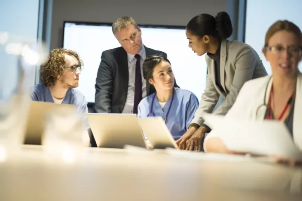 a group of healthcare administration professional working together